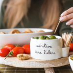 coppetta "UN'OLIVA TIRA L'ALTRA"